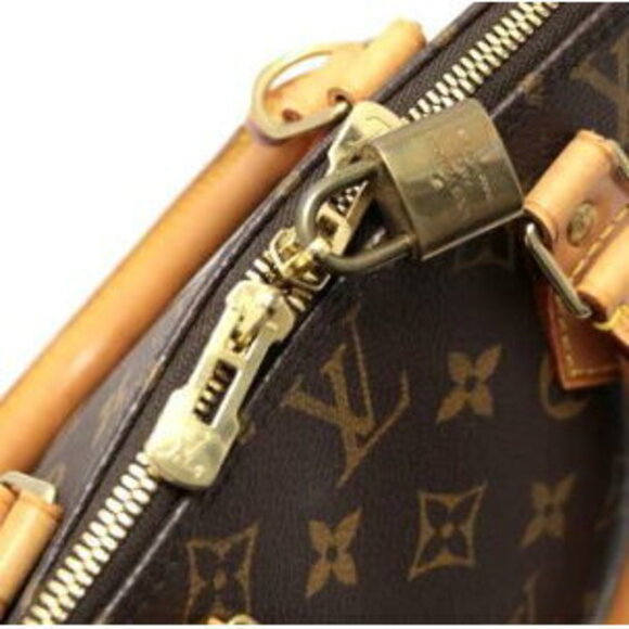 Louis Vuitton Alma Monogram Handbag - Picture 5 of 6
